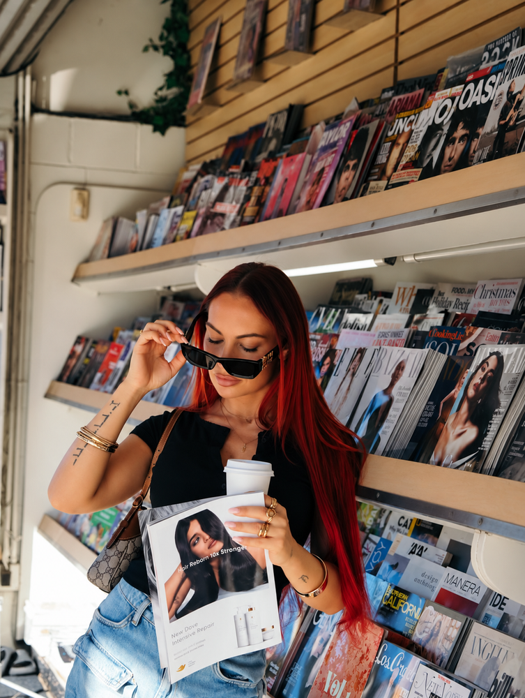 LaTina Rusin at a newsstand